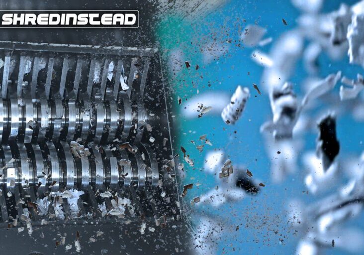 The image shows an industrial paper shredding machine in action, with sharp rotating metal blades tearing through paper. Small fragments and debris are flying outward as the materials are being destroyed. The “Shred Instead” branding appears in the corner, reinforcing the focus on secure document destruction. The scene emphasizes high-powered, on-site shredding equipment designed for secure, efficient disposal of confidential documents.